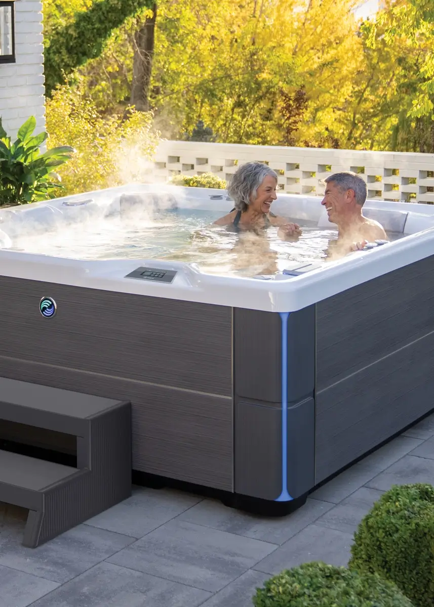 Spas & Hot Tubs Tucson Patio Pools Man and Woman in Highlife HotSprings Luxury Hot Tub Tucson